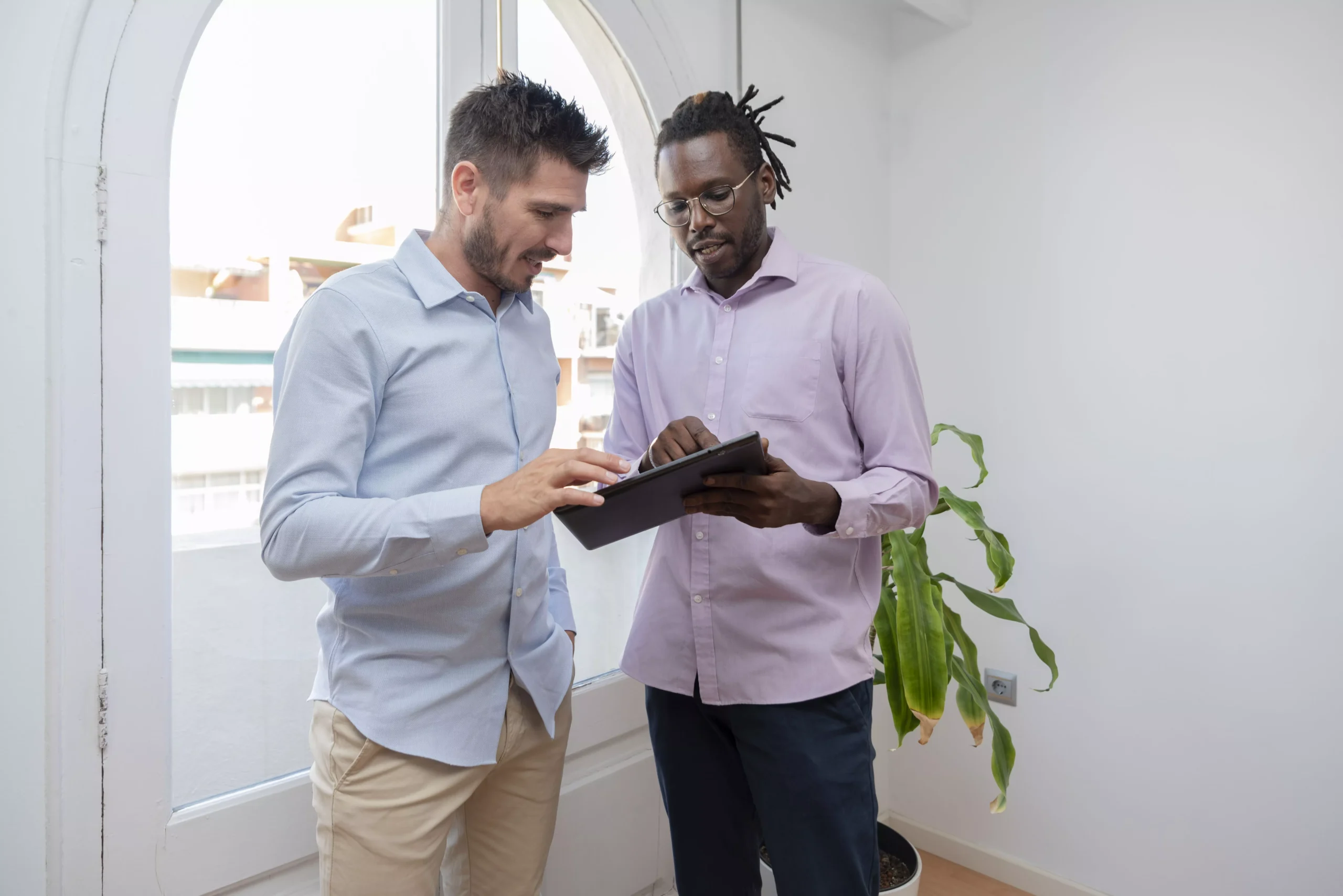 african-american-manager-giving-advice-to-his-coll