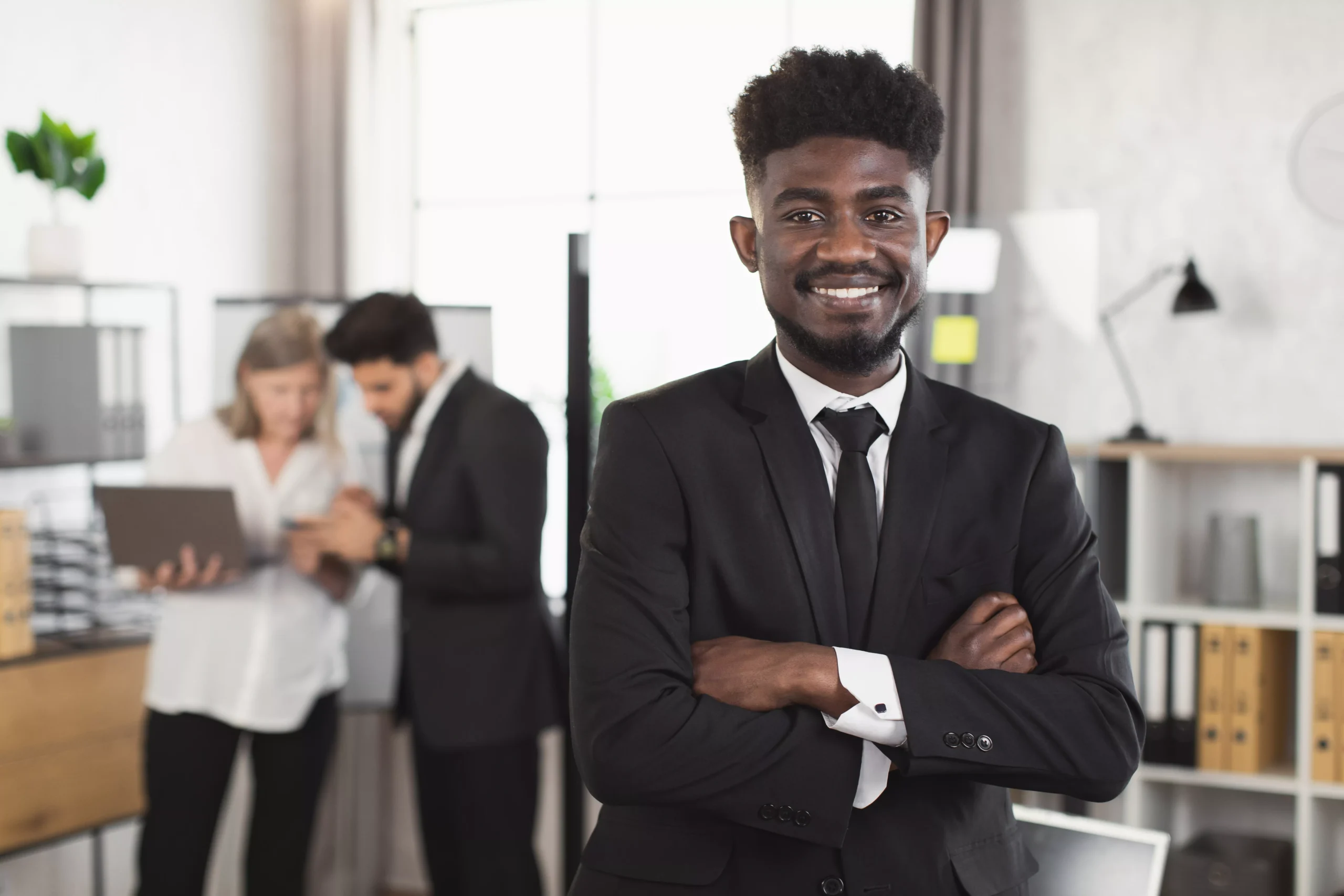 african-businessman-with-crossed-arms-posing