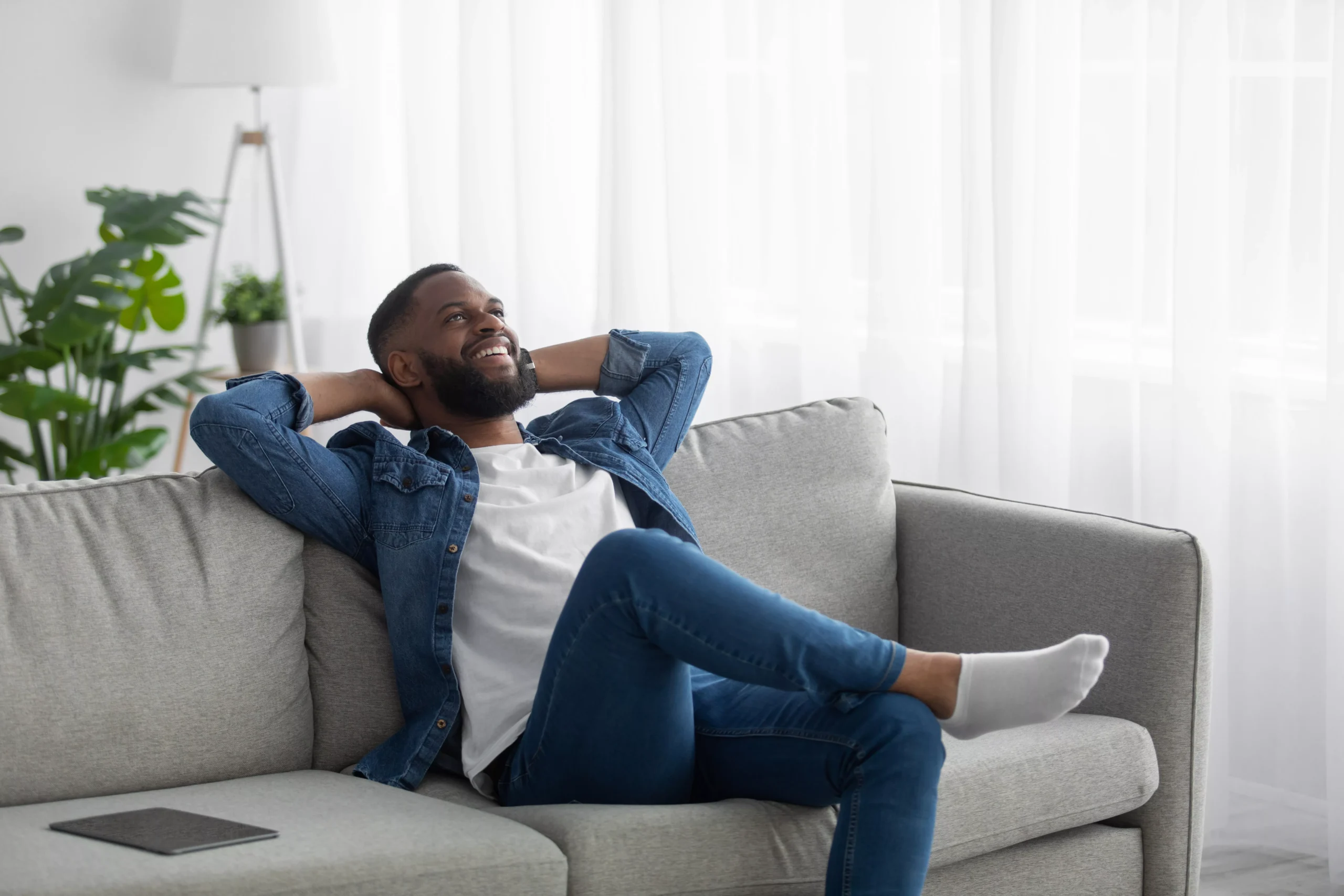 happy-satisfied-relaxed-young-black-bearded-male