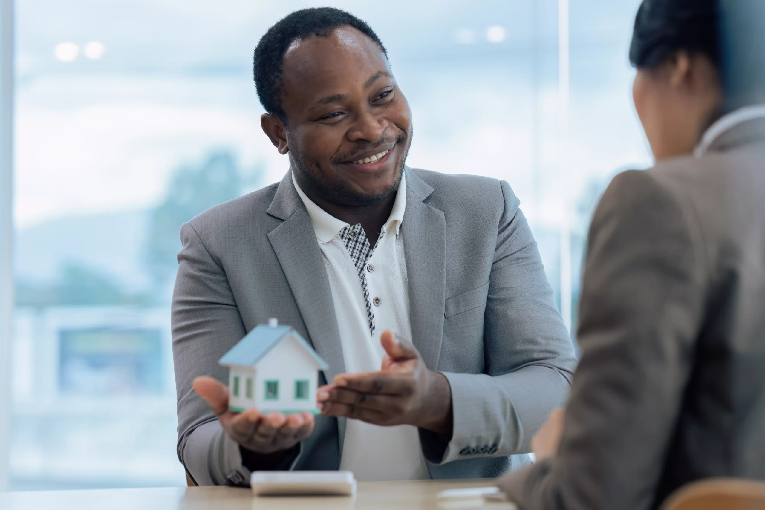 real-estate-agent-and-client-talking-about-property