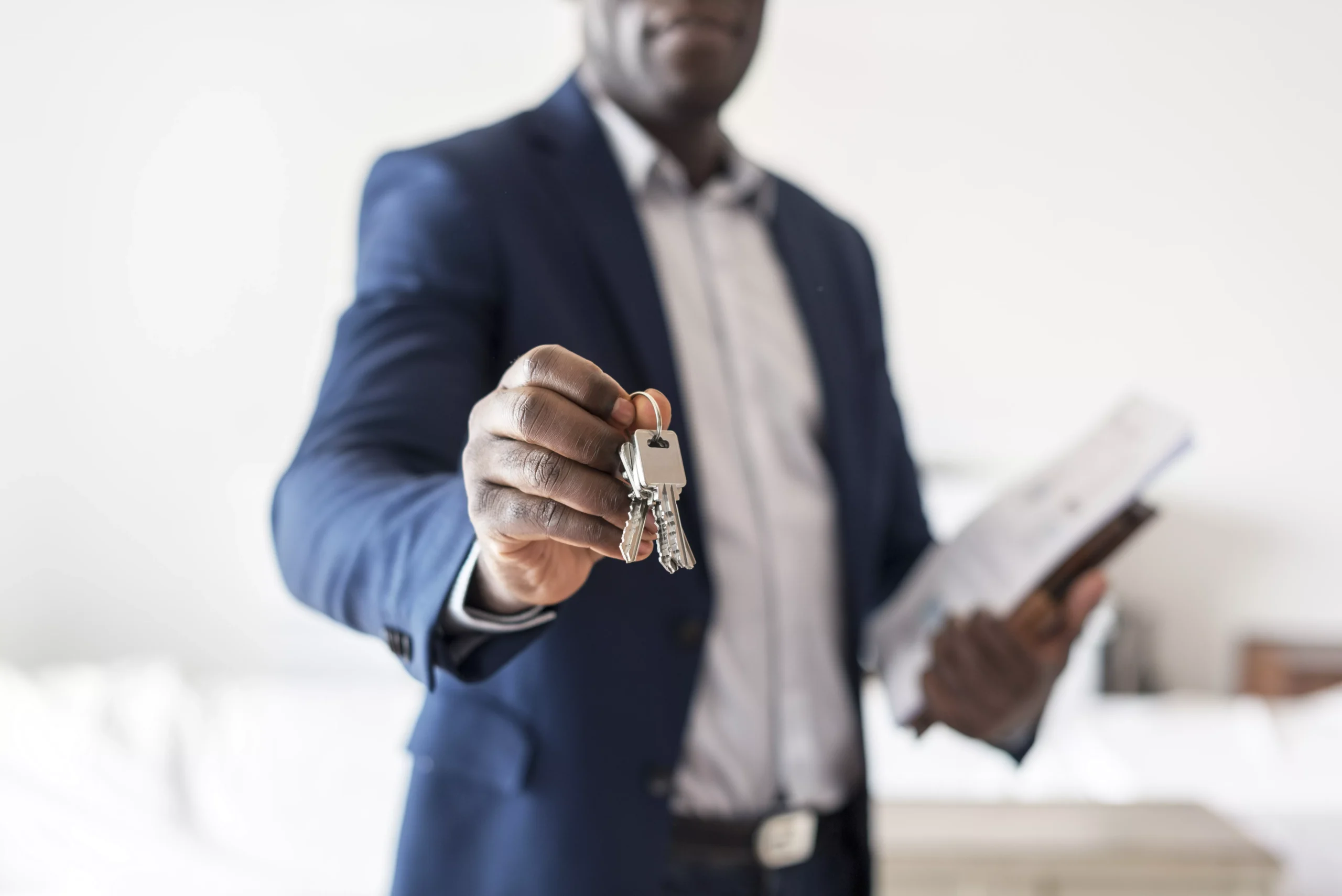 real-estate-agent-handing-the-house-key