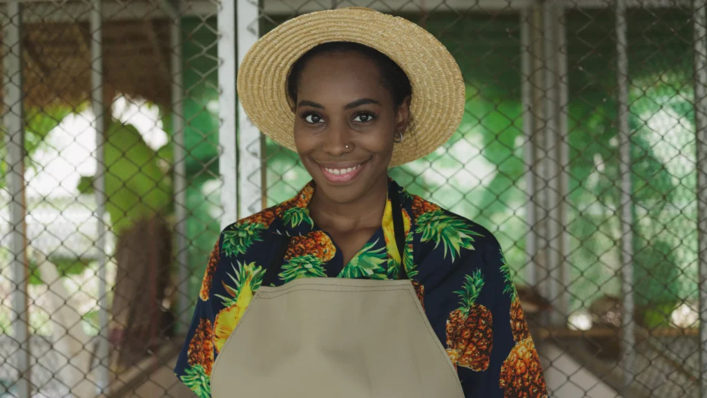 african-farmer-poses-with-crossed-arms-and-a-smile
