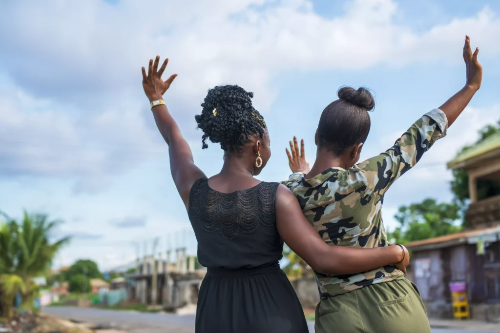 back-view-of-two-young-black-females-celebrating