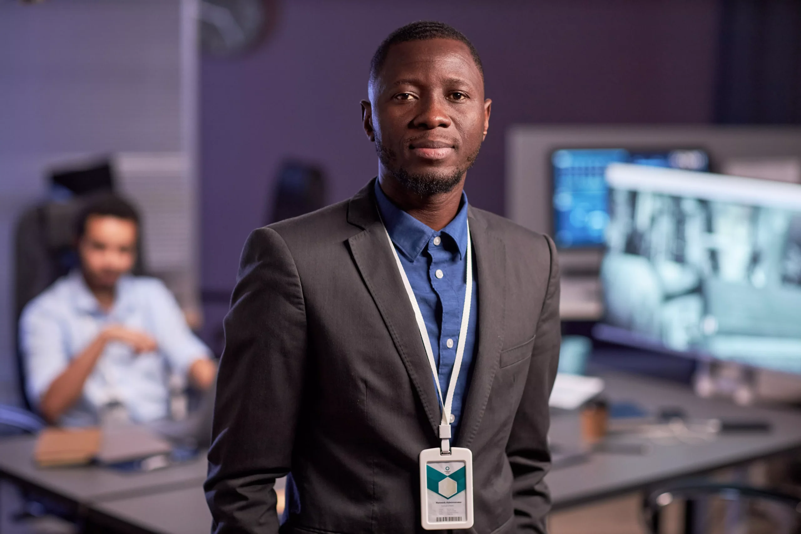 businessman-wearing-suit-while-standing-in