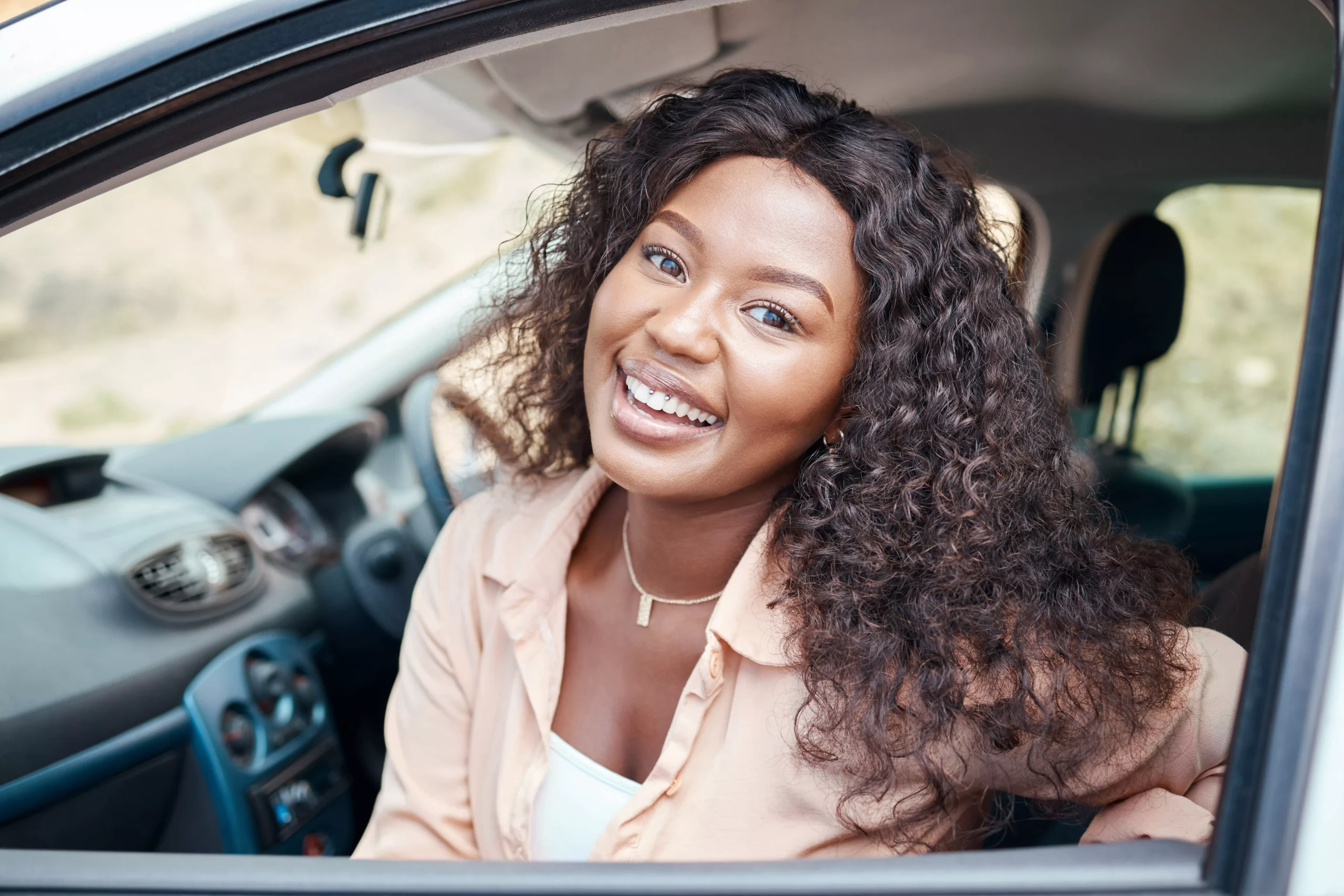 black-woman-car-owner-and-happy-with-smile-for-su
