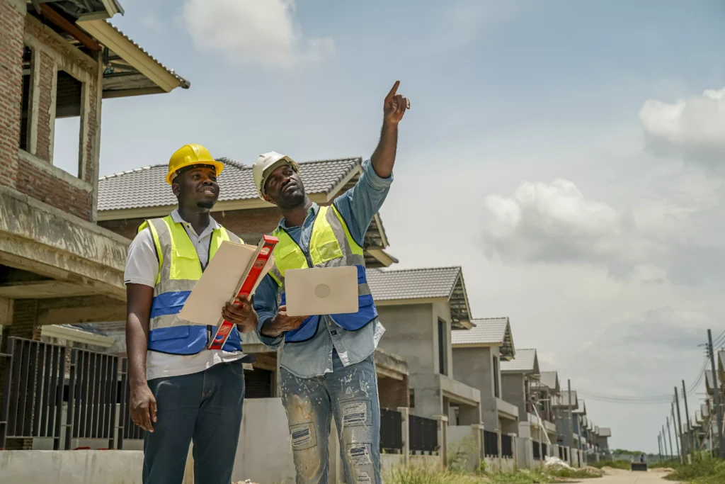 construction-workers-discuss-project-progress-unde