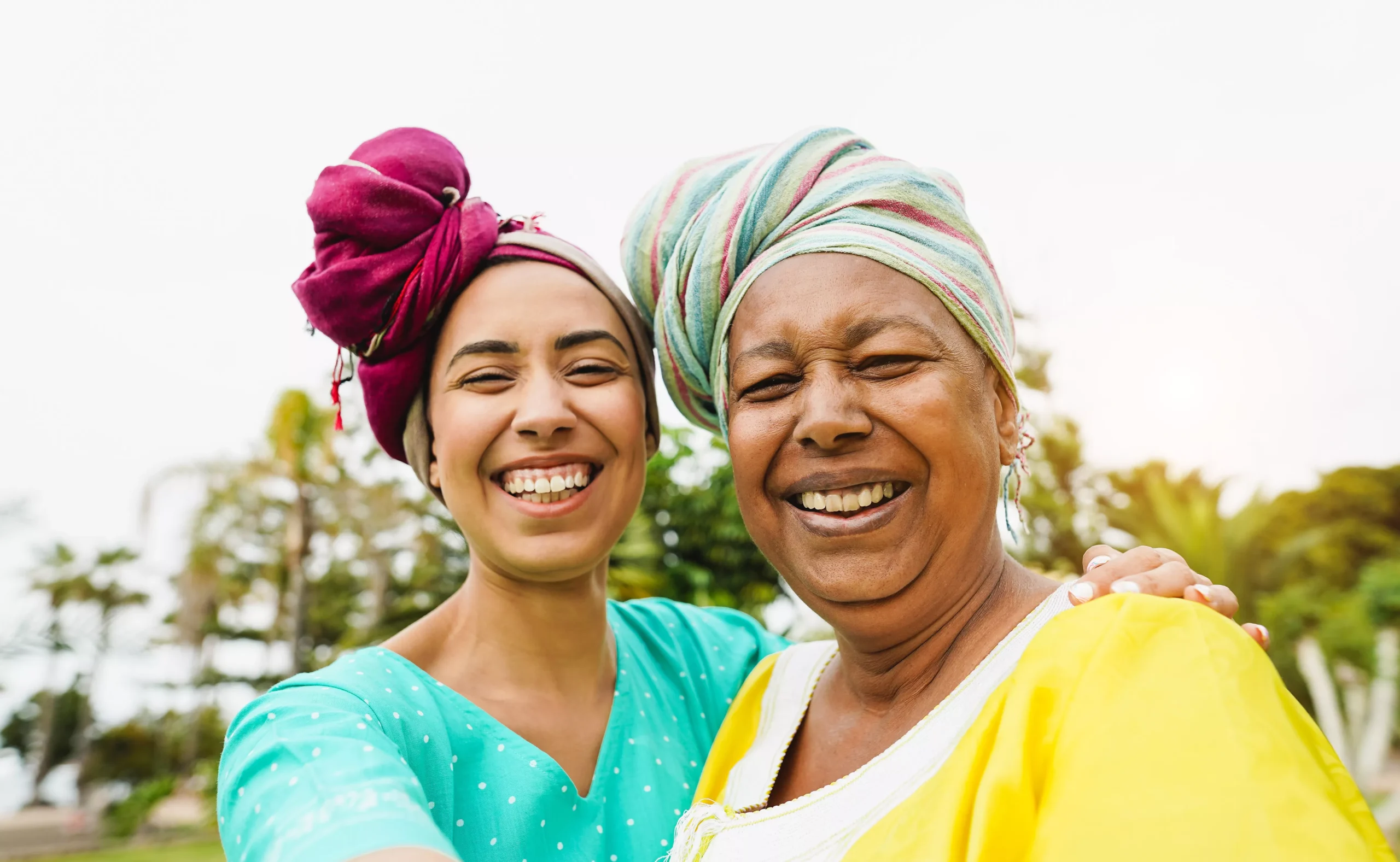 happy-african-mother-and-daughter-wearing-traditio