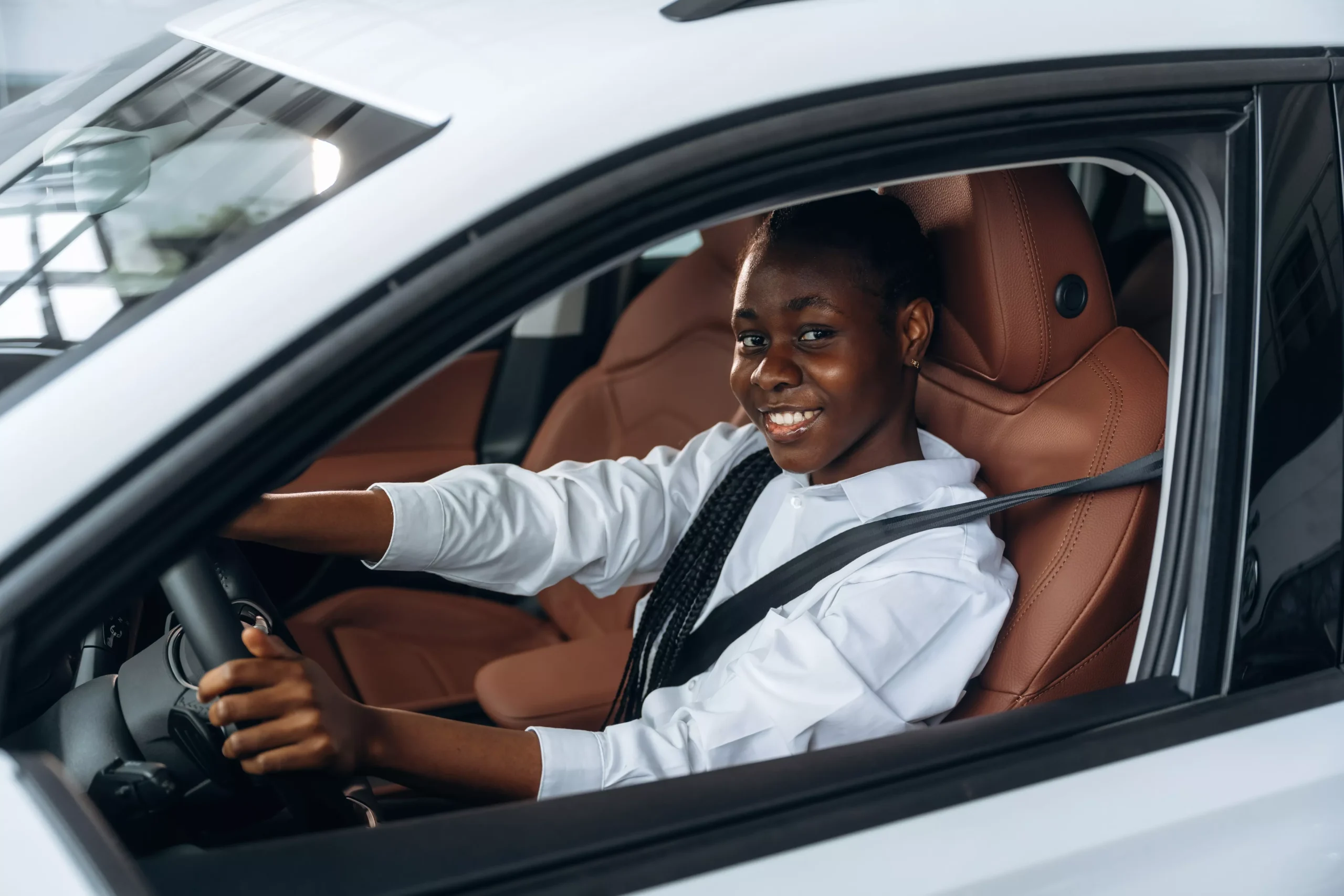 in-white-shirt-woman-is-in-the-modern-car