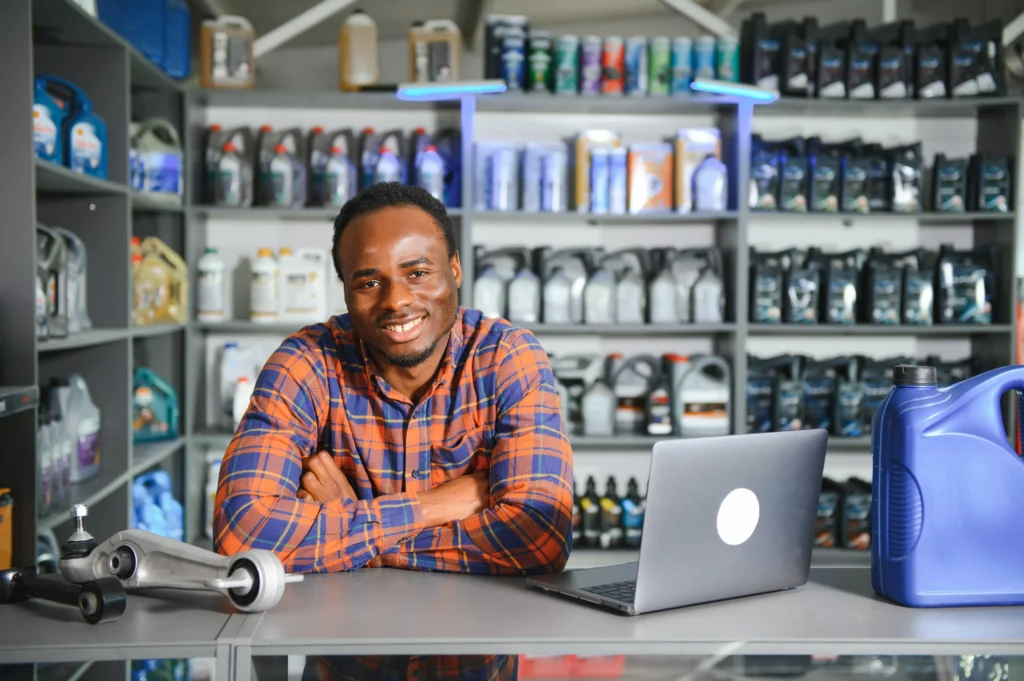 portrait-of-a-handsome-african-salesman-in-an-auto