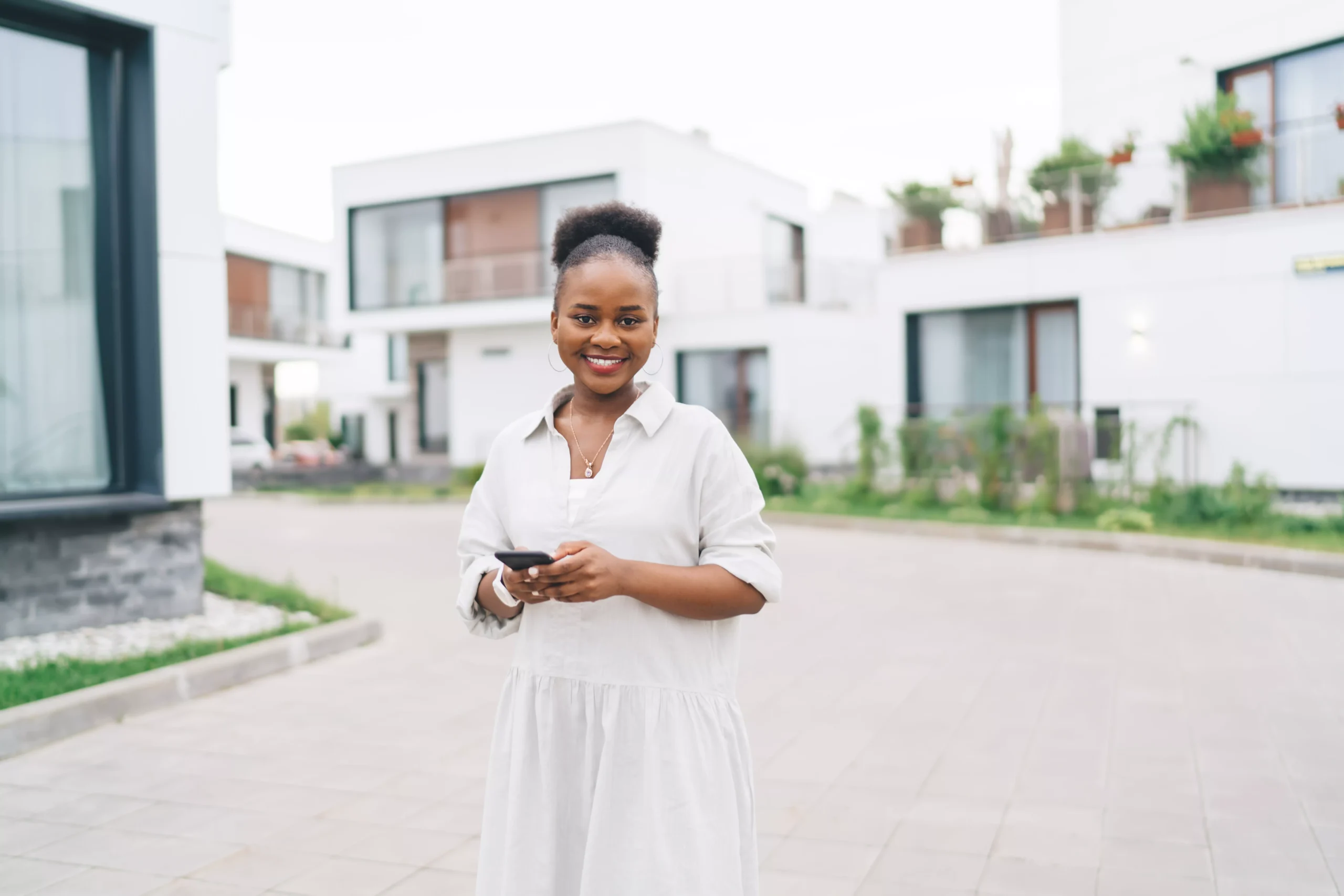 smiling-african-american-woman-with-smartphone