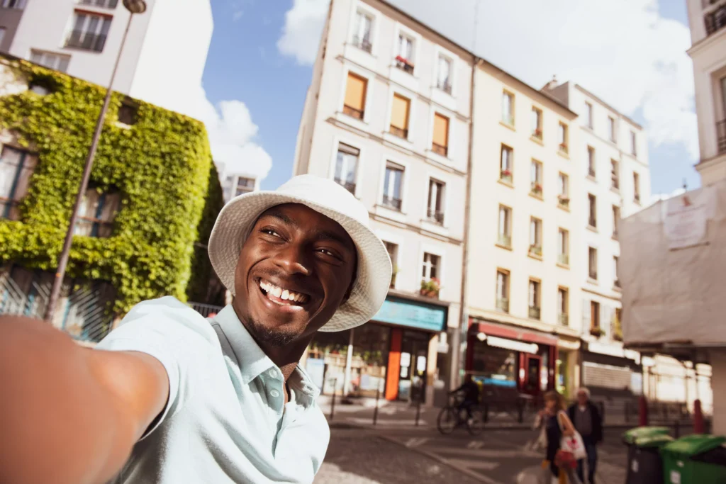 selective-focus-shot-of-a-smiling-black-male-with