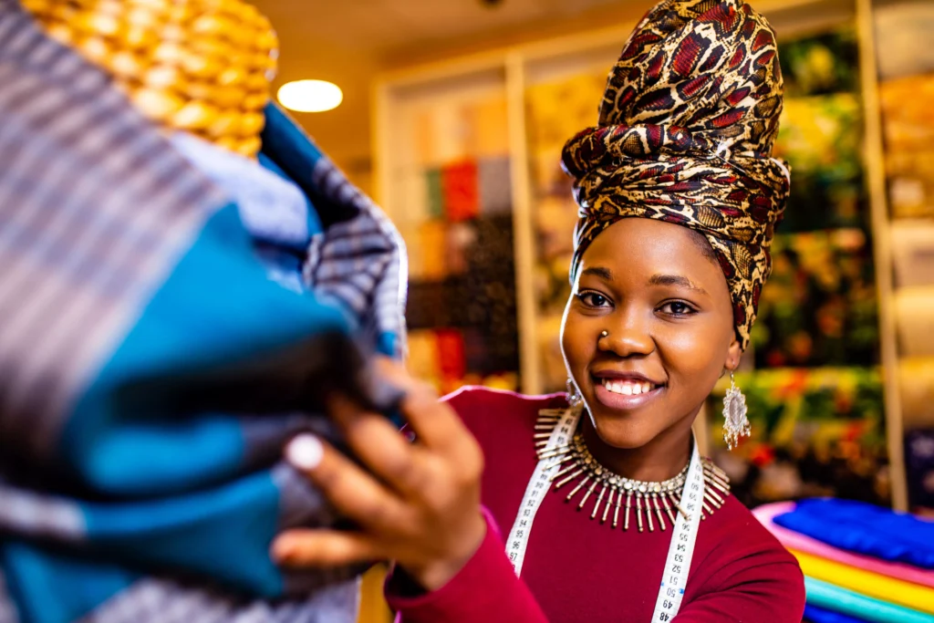 tanzanian-woman-with-snake-print-turban-over-hear