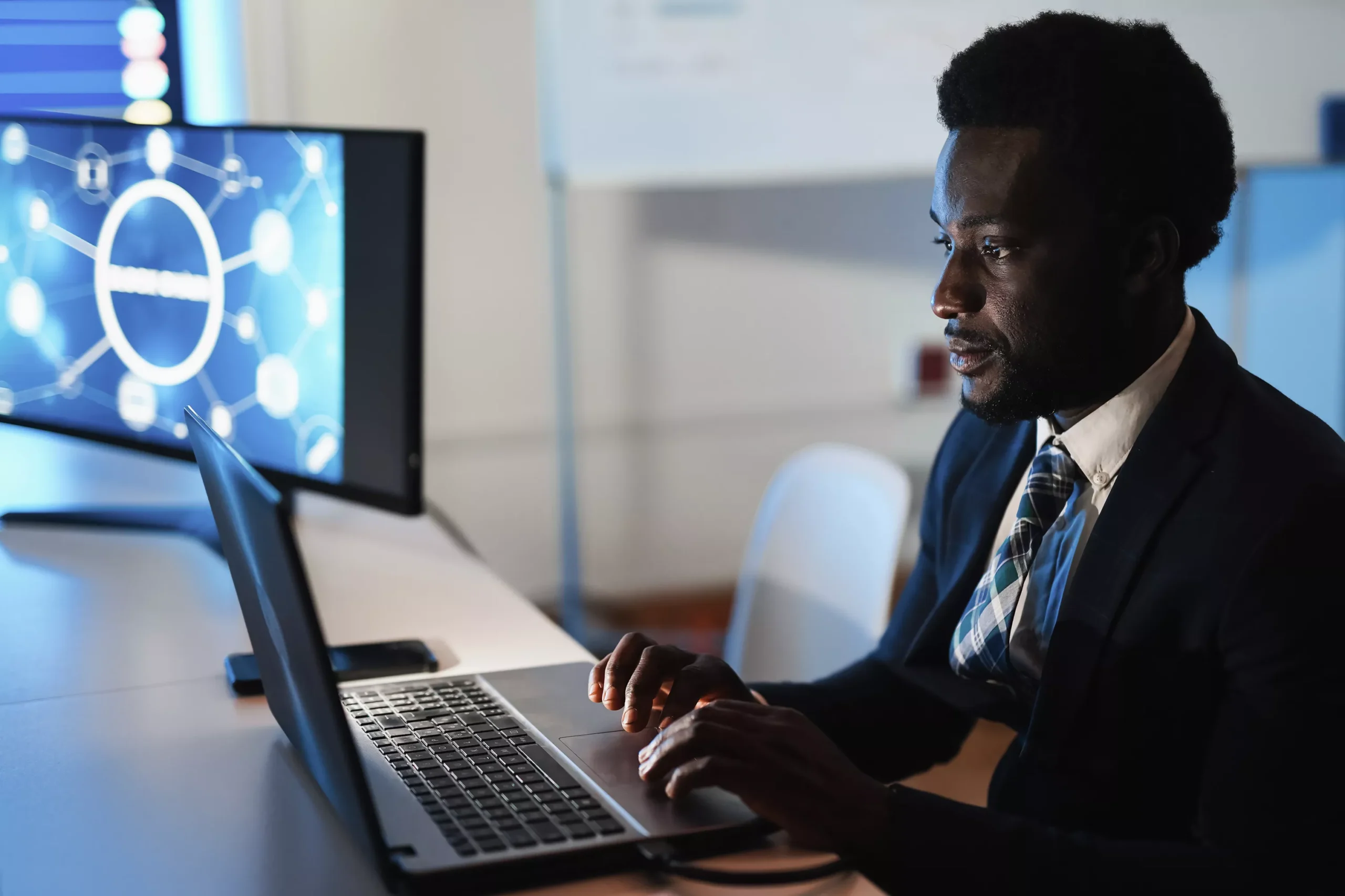 trader-african-man-making-blockchain-research