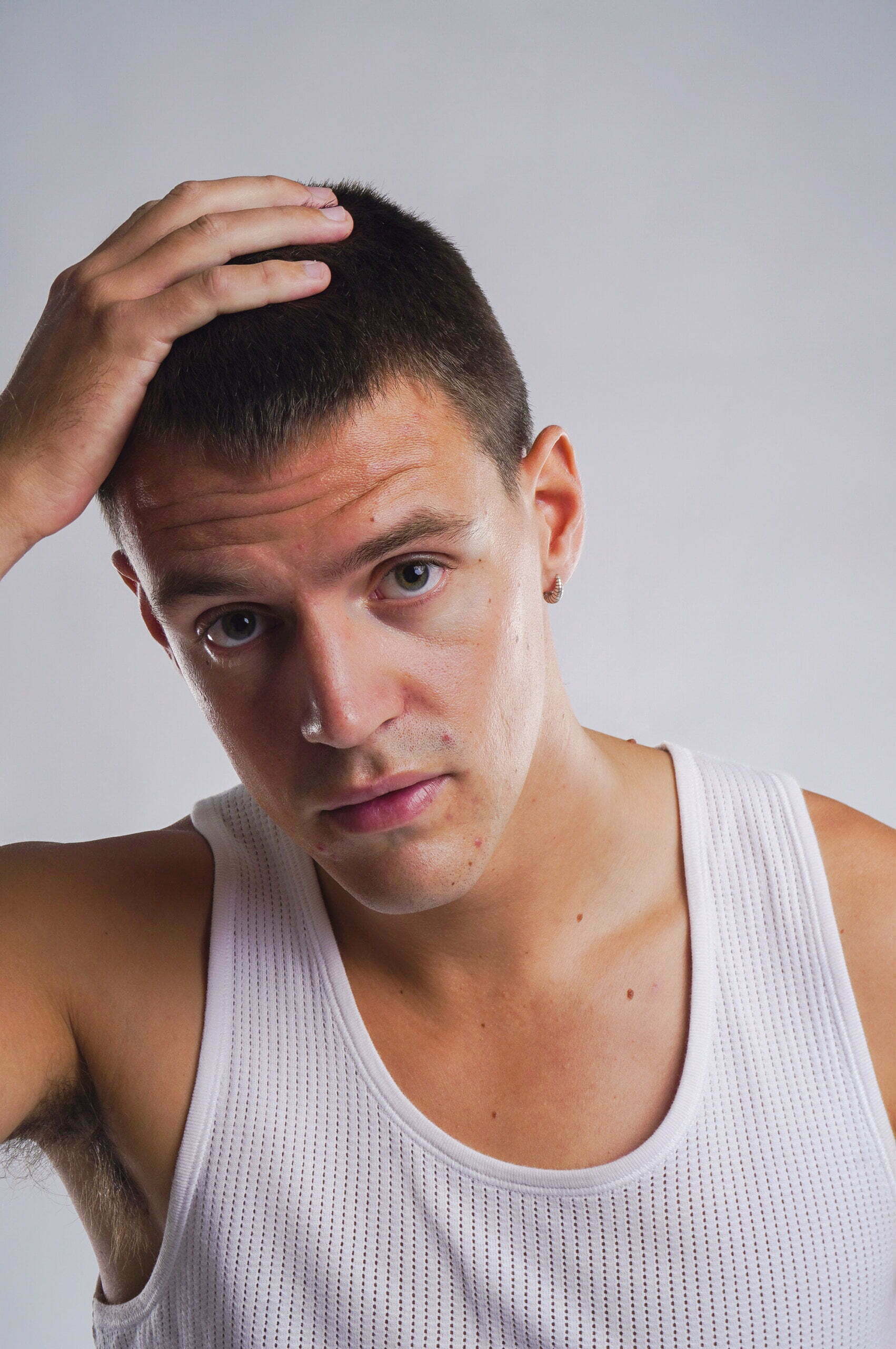 3. Ben Raw - Satu Studio Bali Model White Tank Top