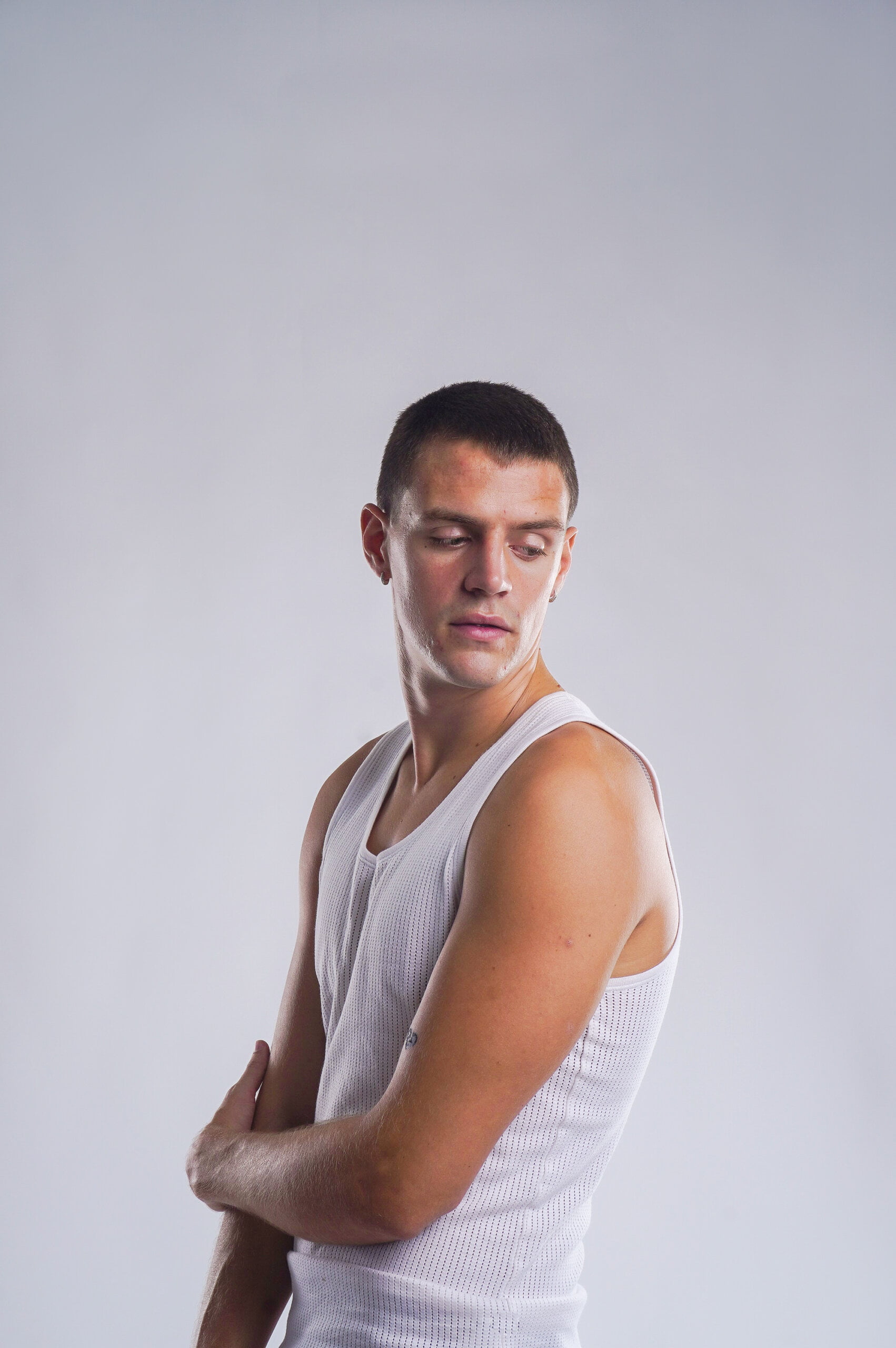 4. Ben Raw - Satu Studio Bali Model White Tank Top